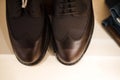 MeÃâ`s clothing store. Men`s black leather shoes derby on a store shelf, top down. Royalty Free Stock Photo